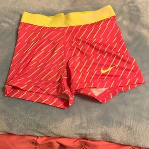 Yellow and Pink Nike spandex